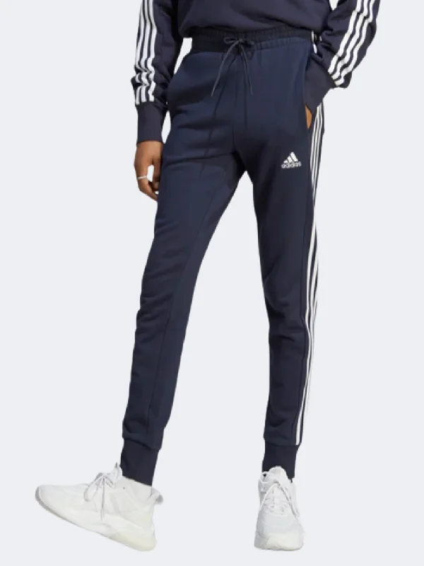 Versatile 4-Way Stretch Pants-Adidas Essentials French Terry Tapered Cuff 3-Stripes Men Sportswear Pant Legend Ink